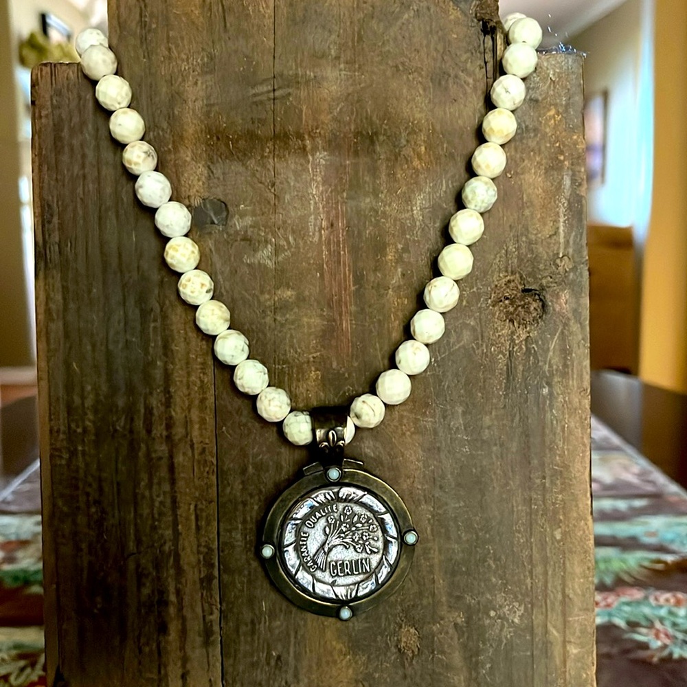 French Kande vintage French medallion necklace.